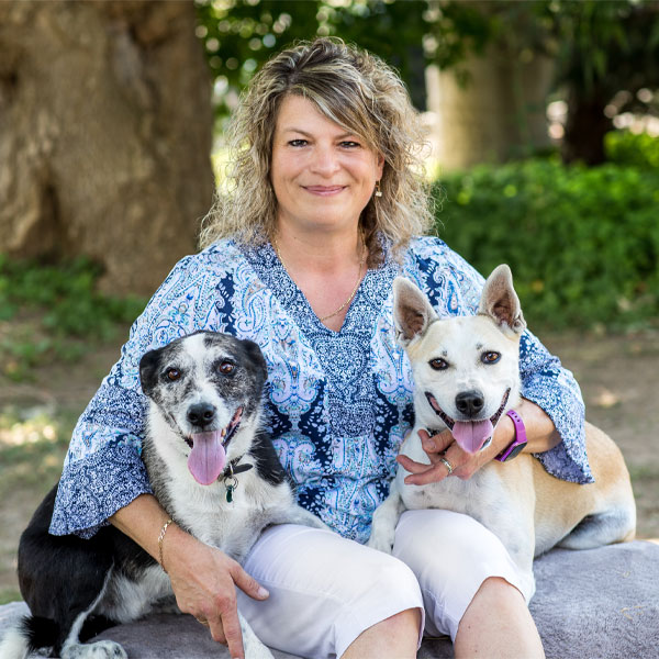 Dr Isabel Hetram with her two dogs