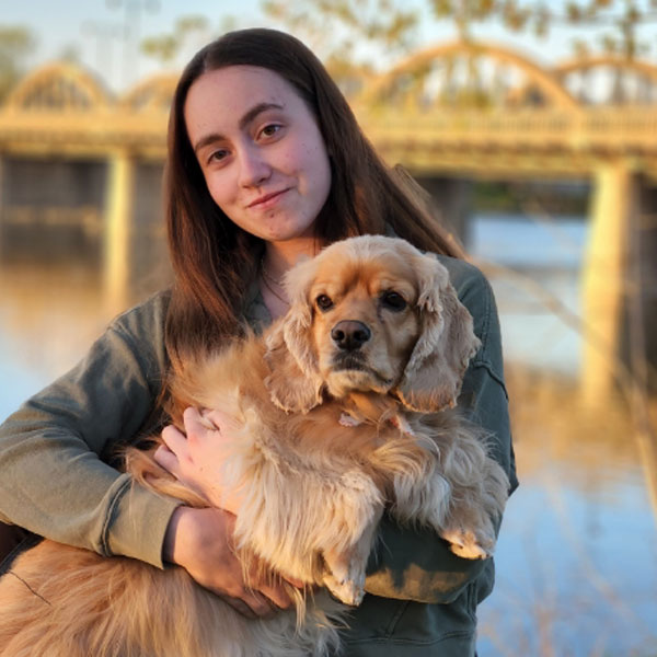 Kayla with her dog